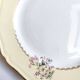 Round vintage plate L'Amandinoise model Paola cream and white flowers