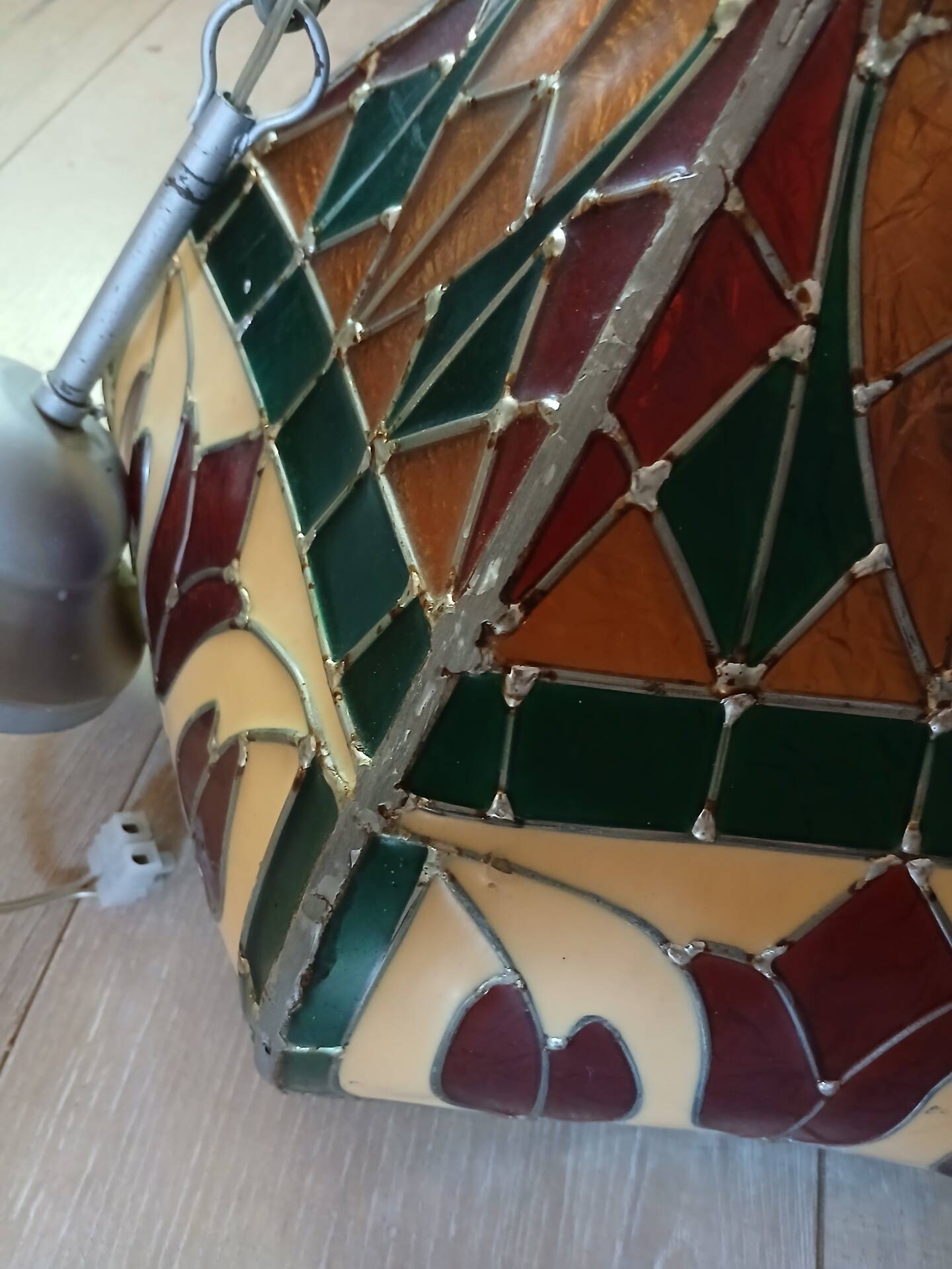 Vintage pendant light with multicoloured stained glass.