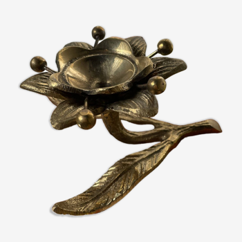 Brass-plated flowered hand candle holder