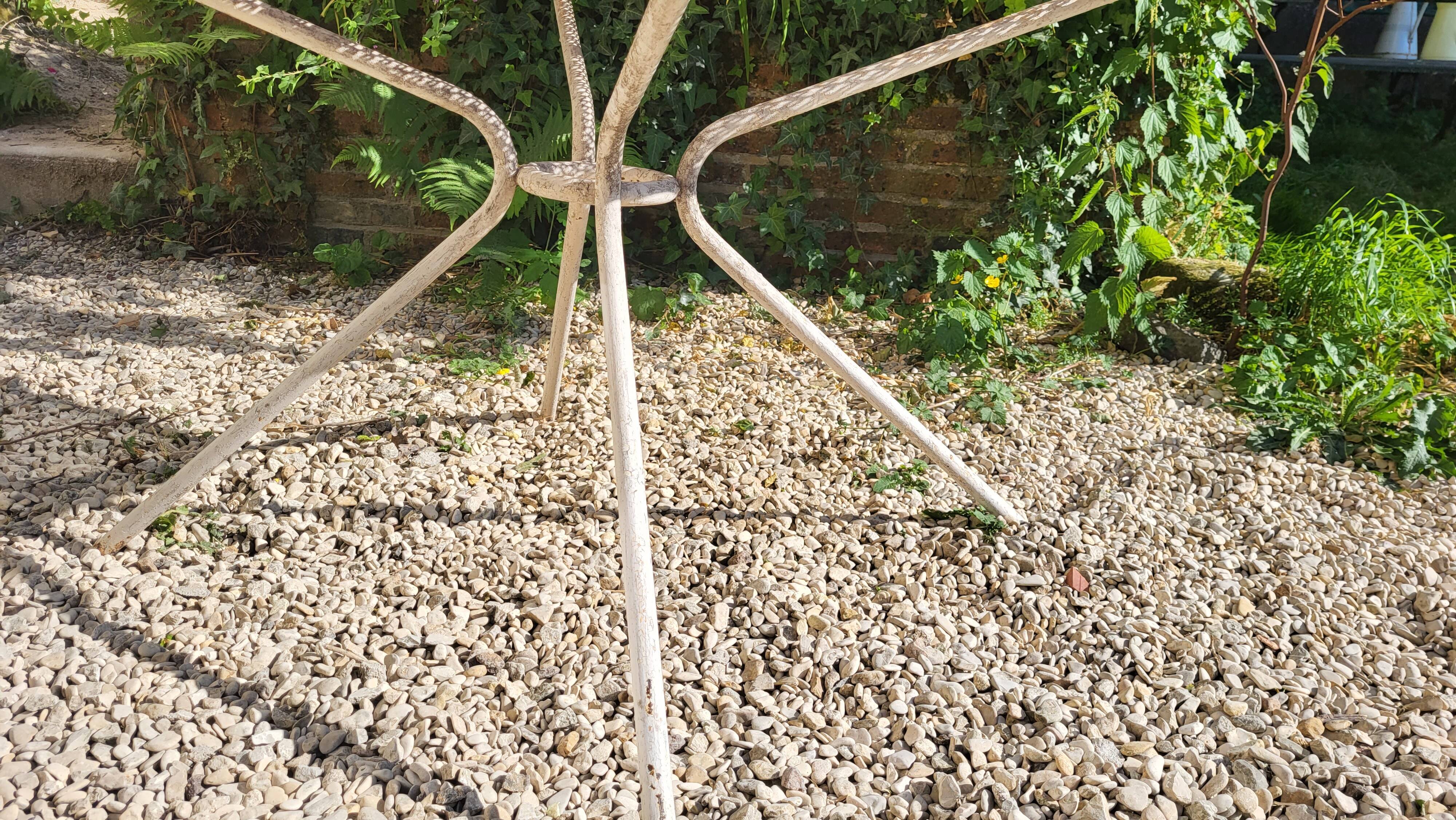 Perforated sheet metal garden table