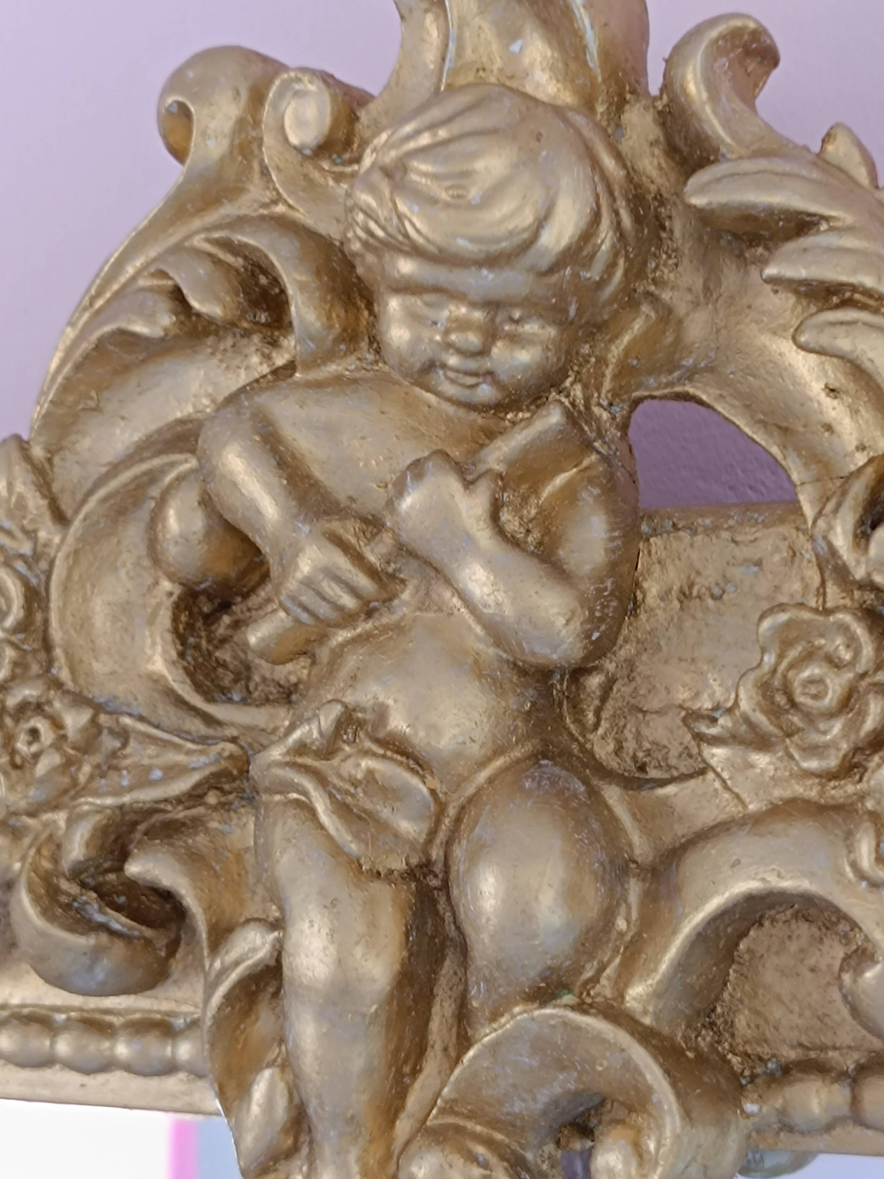 Gilded mirror with a Louis Philippe style pediment