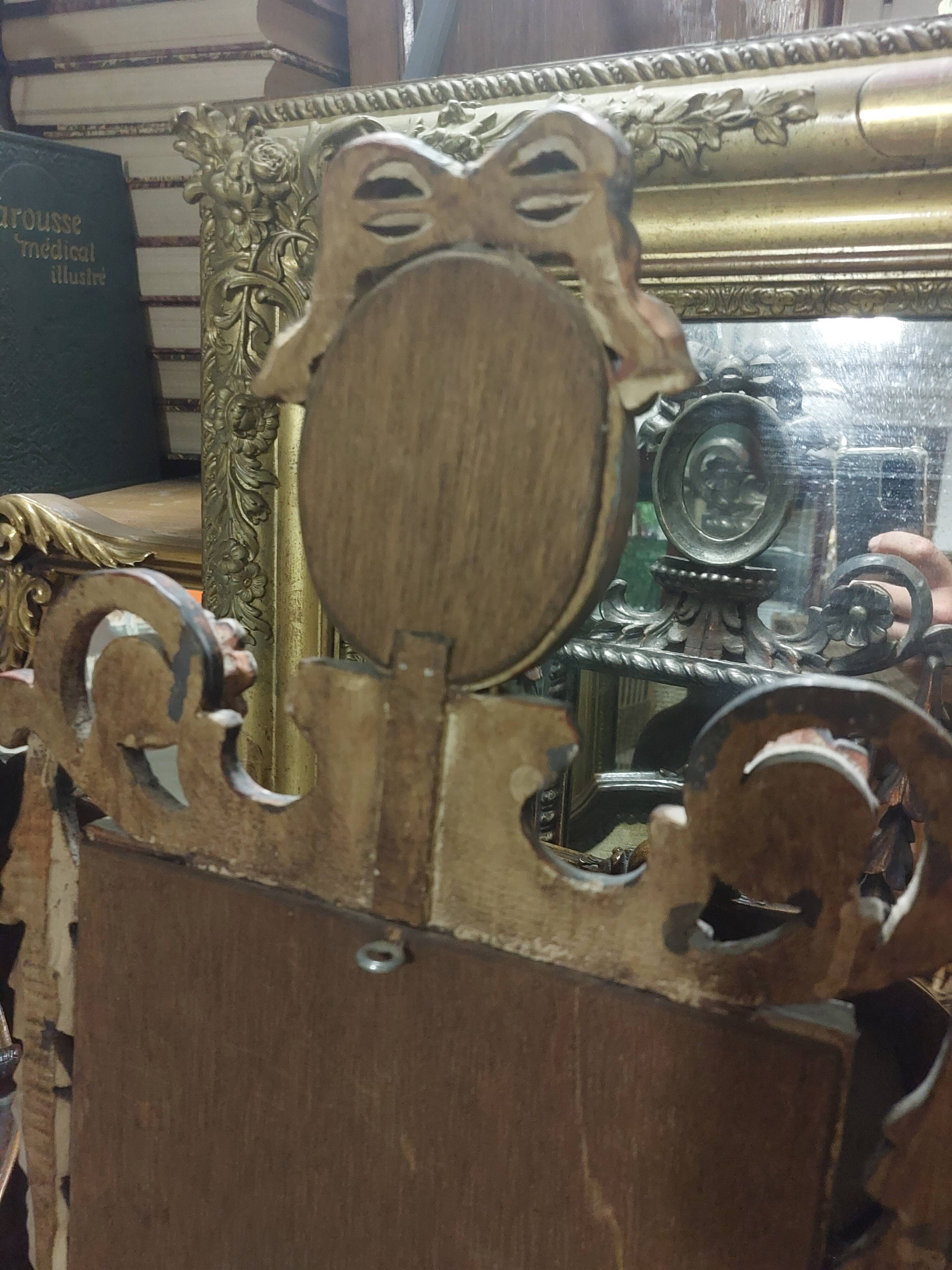 Louis XVI style mirror decorated in wood