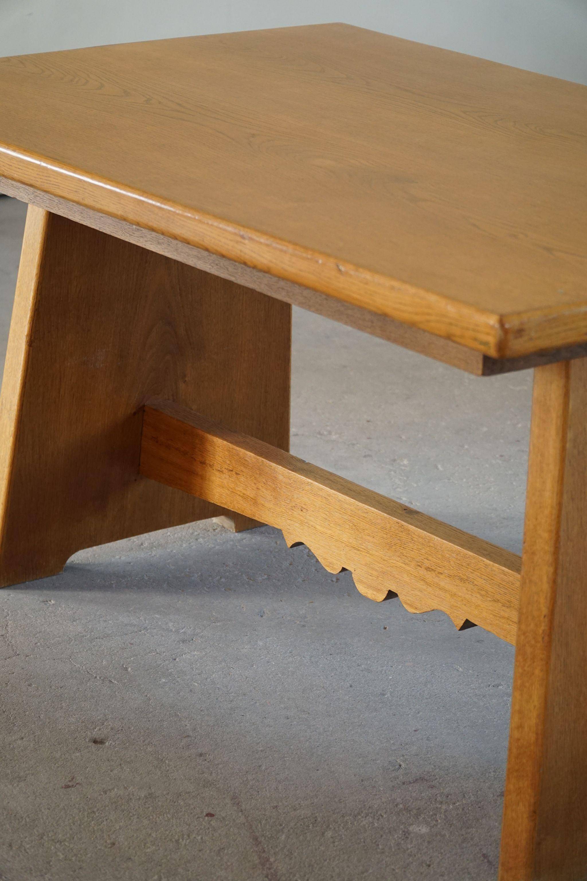Mid-century brutalist dining table, made of oak, Danish craftsmanship, 1950s.