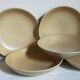 Five vintage natural stoneware soup plates