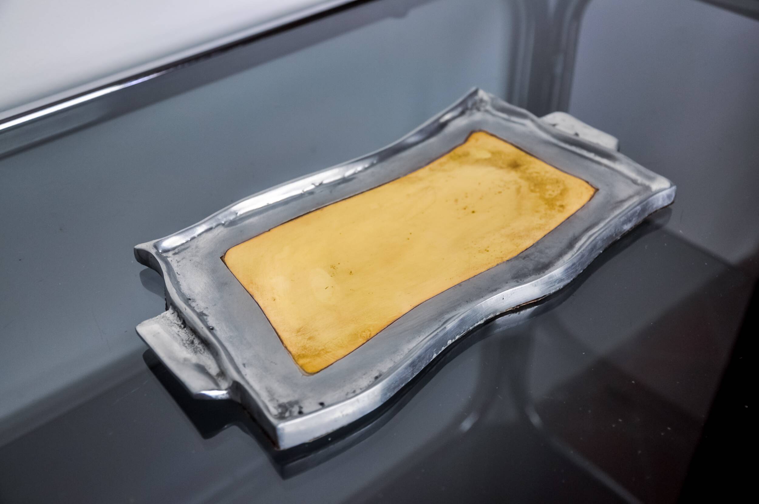 Brutalist pocket emptier by Leopold, bronze and aluminum 1970, Spain