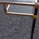 Golden and iridescent metal desk with a glass top from the 70s/80s.