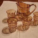 Verseuse et ses quatre verres rose orangé