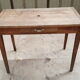 Old table feet spindles one drawer piling