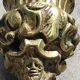 Bougeoir flambeau style Baroque/Antique, XIXème, en bronze doré. Motifs têtes, arabesques volutes