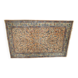 Large wool and silk oriental carpet.