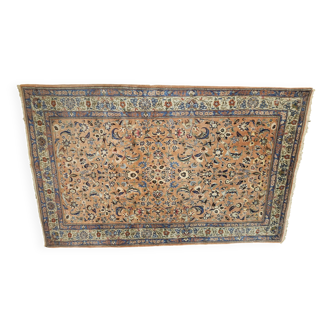 Large wool and silk oriental carpet.
