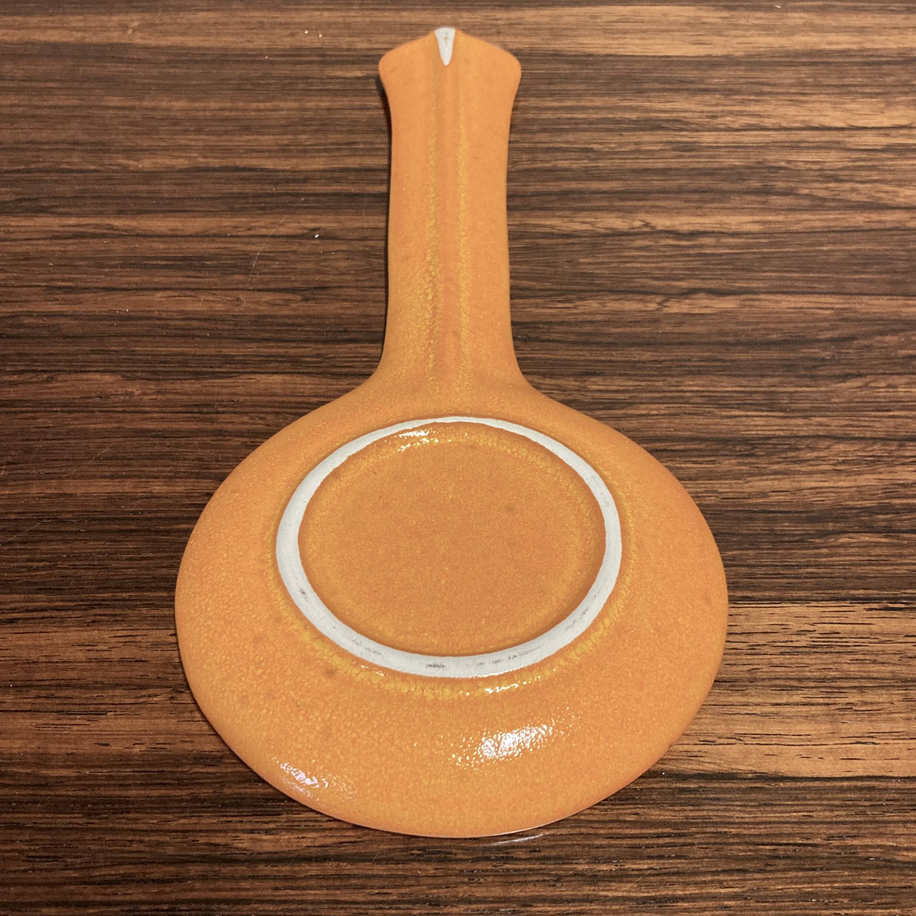 Pair of entirely handmade ceramic spoons.