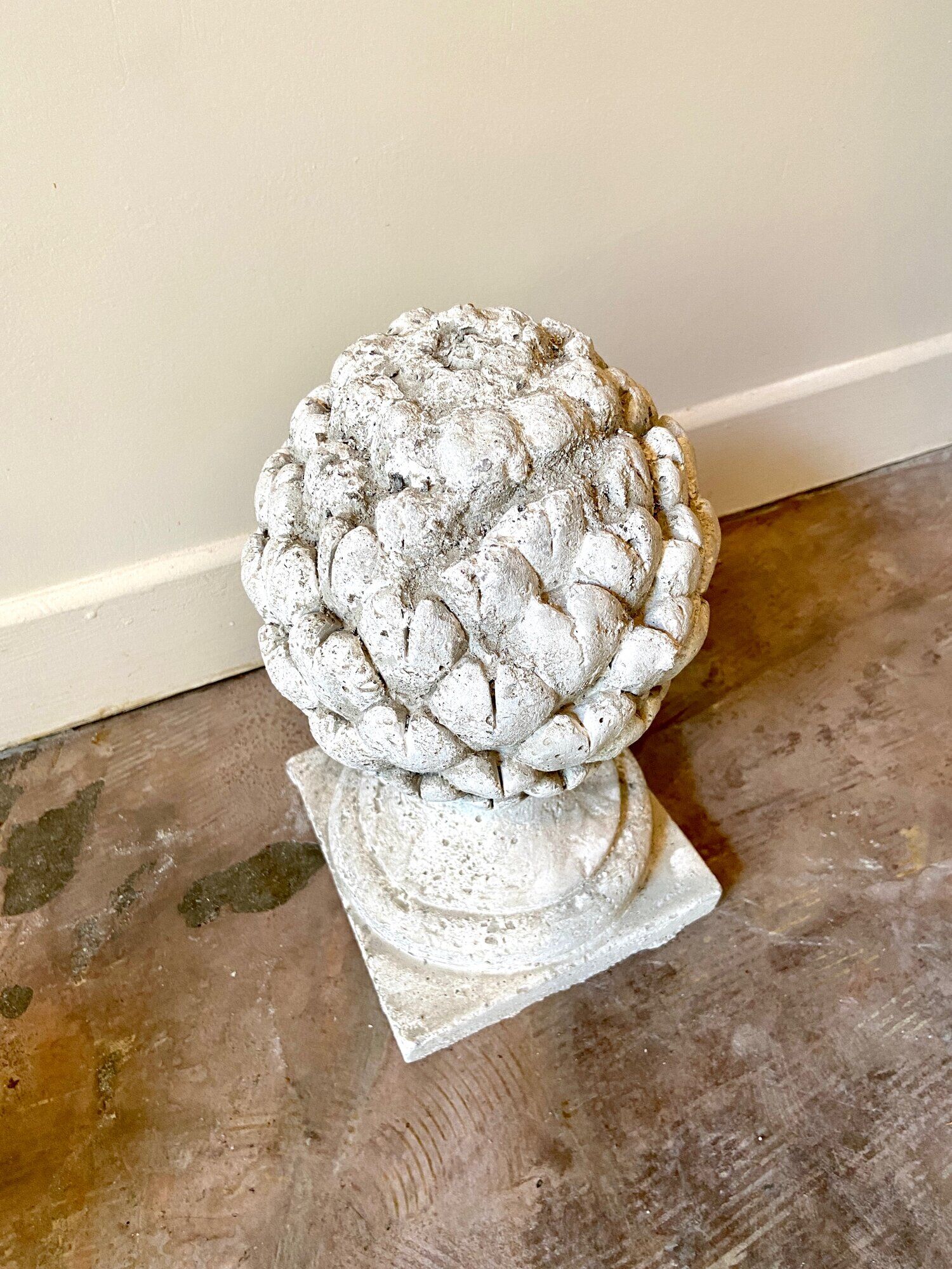 Ornamental artichoke in bleached concrete