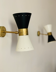 Pair of black Italian diabolo wall lights.
