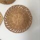 Wall composition of 9 wicker baskets and trays.
