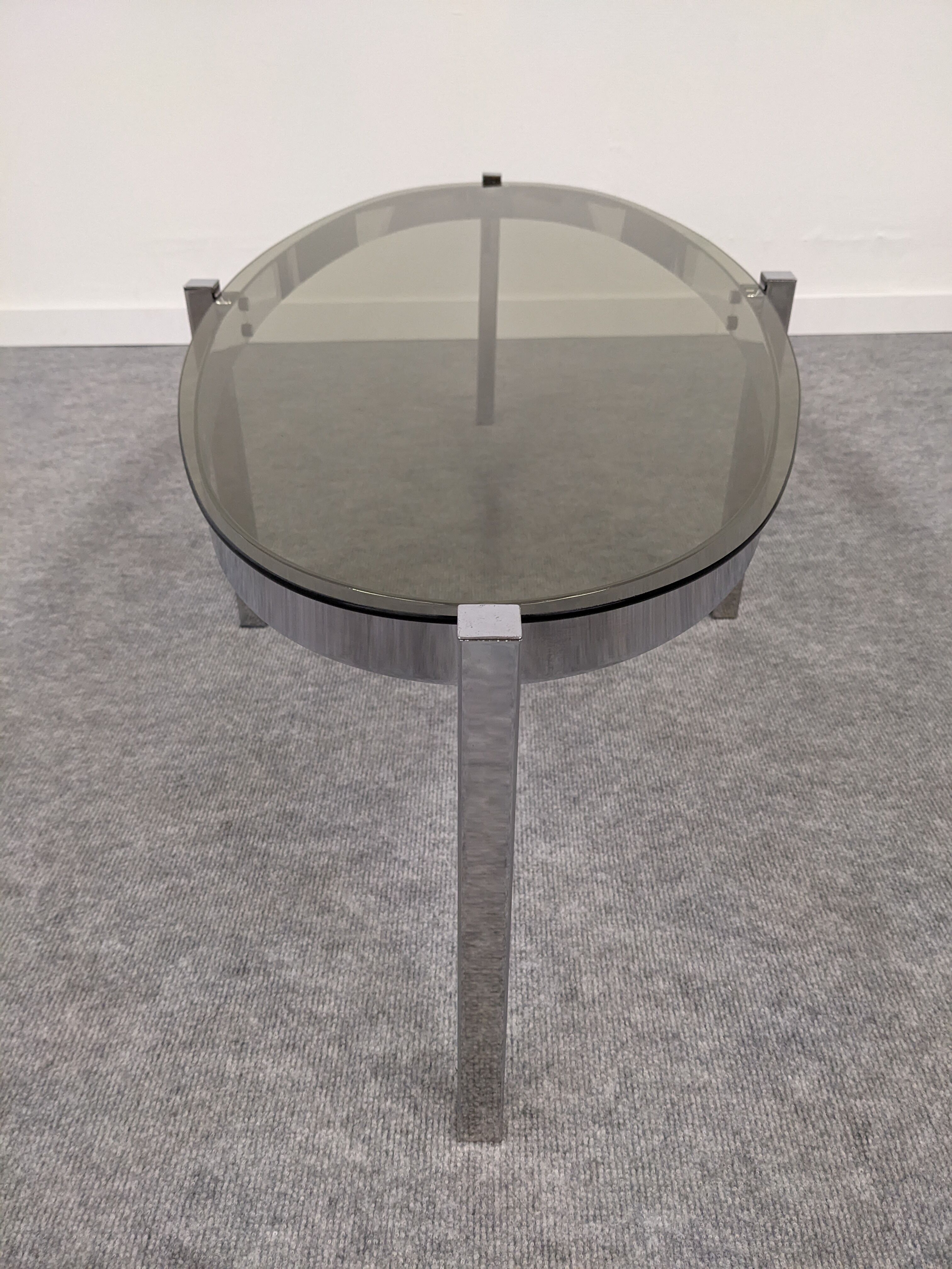Oval smoked glass coffee table from the 60s/70s