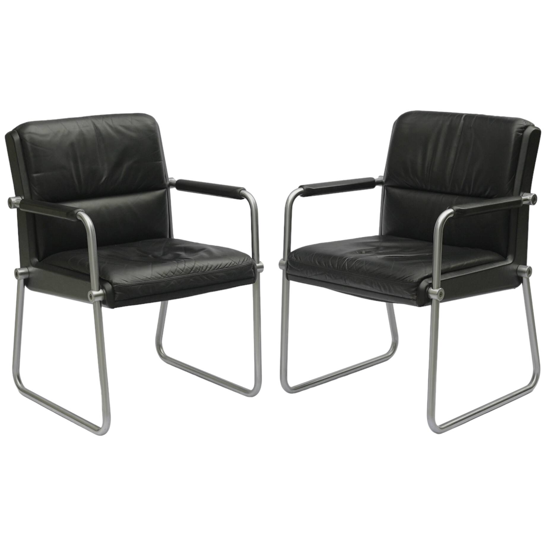 A pair of Bauhaus armchairs, chromed steel tubes, leather, Germany, 1970