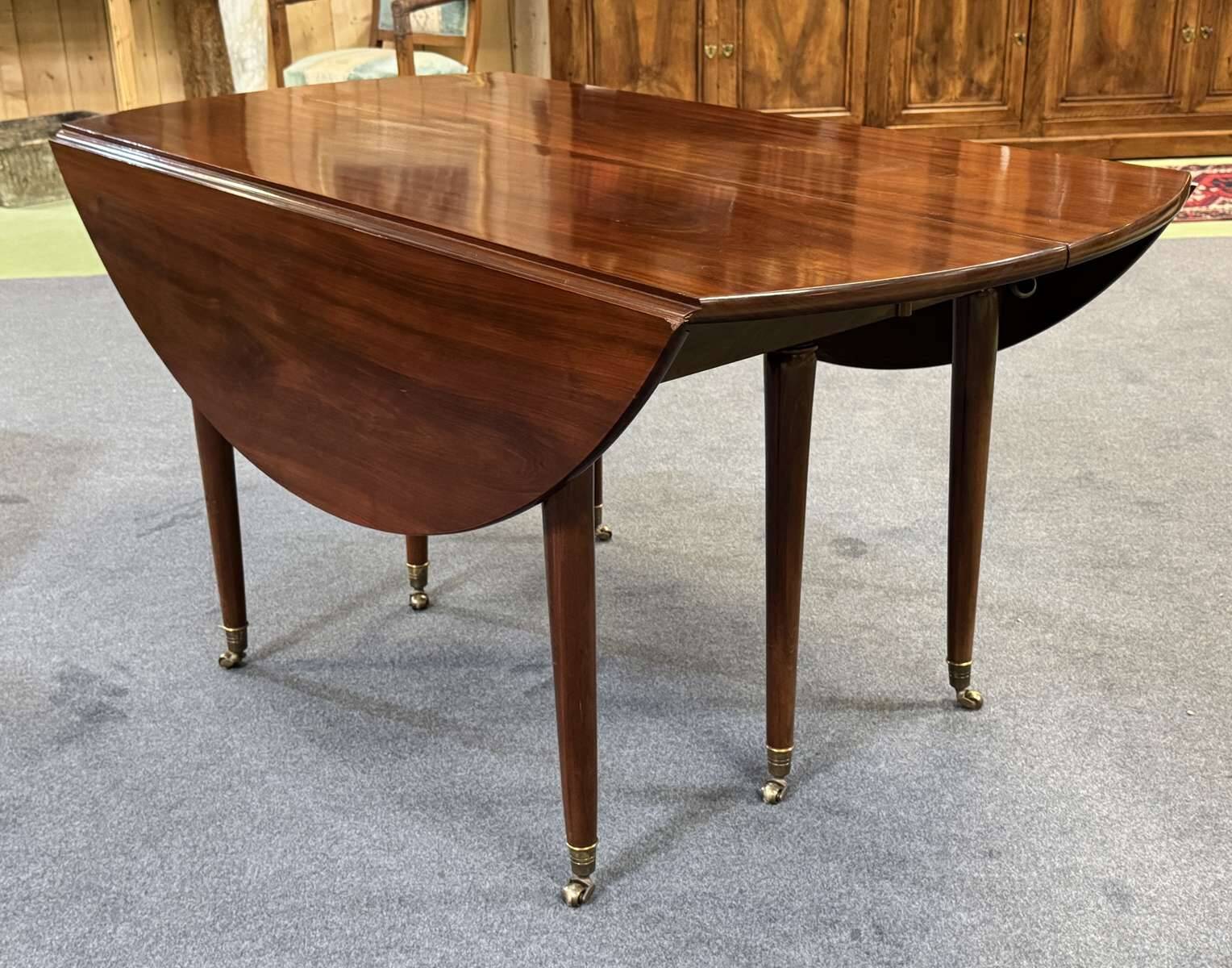 19th-century Louis XVI dining table in Cuban mahogany.