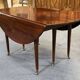 19th-century Louis XVI dining table in Cuban mahogany.