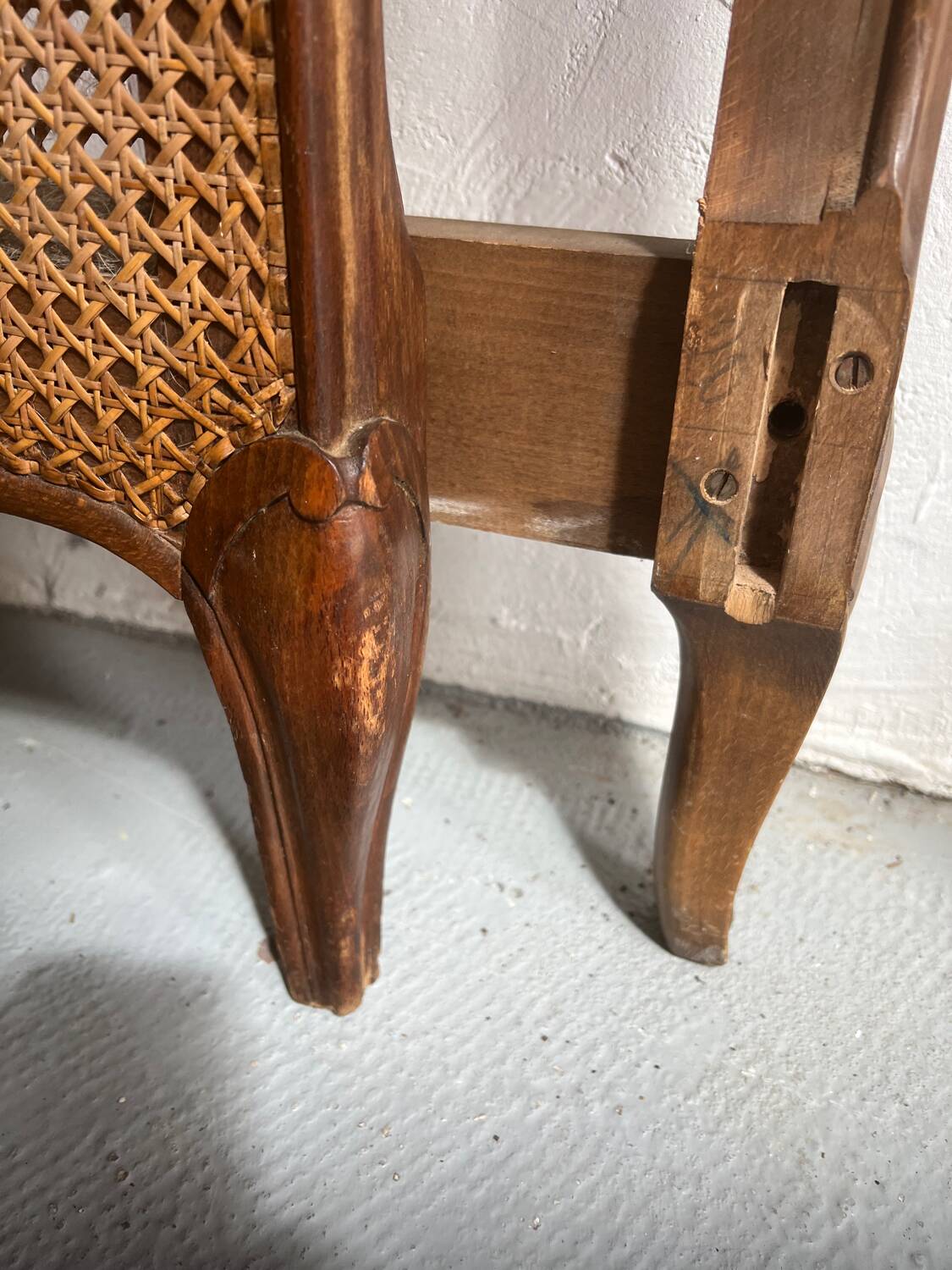 Old wooden and cane bed