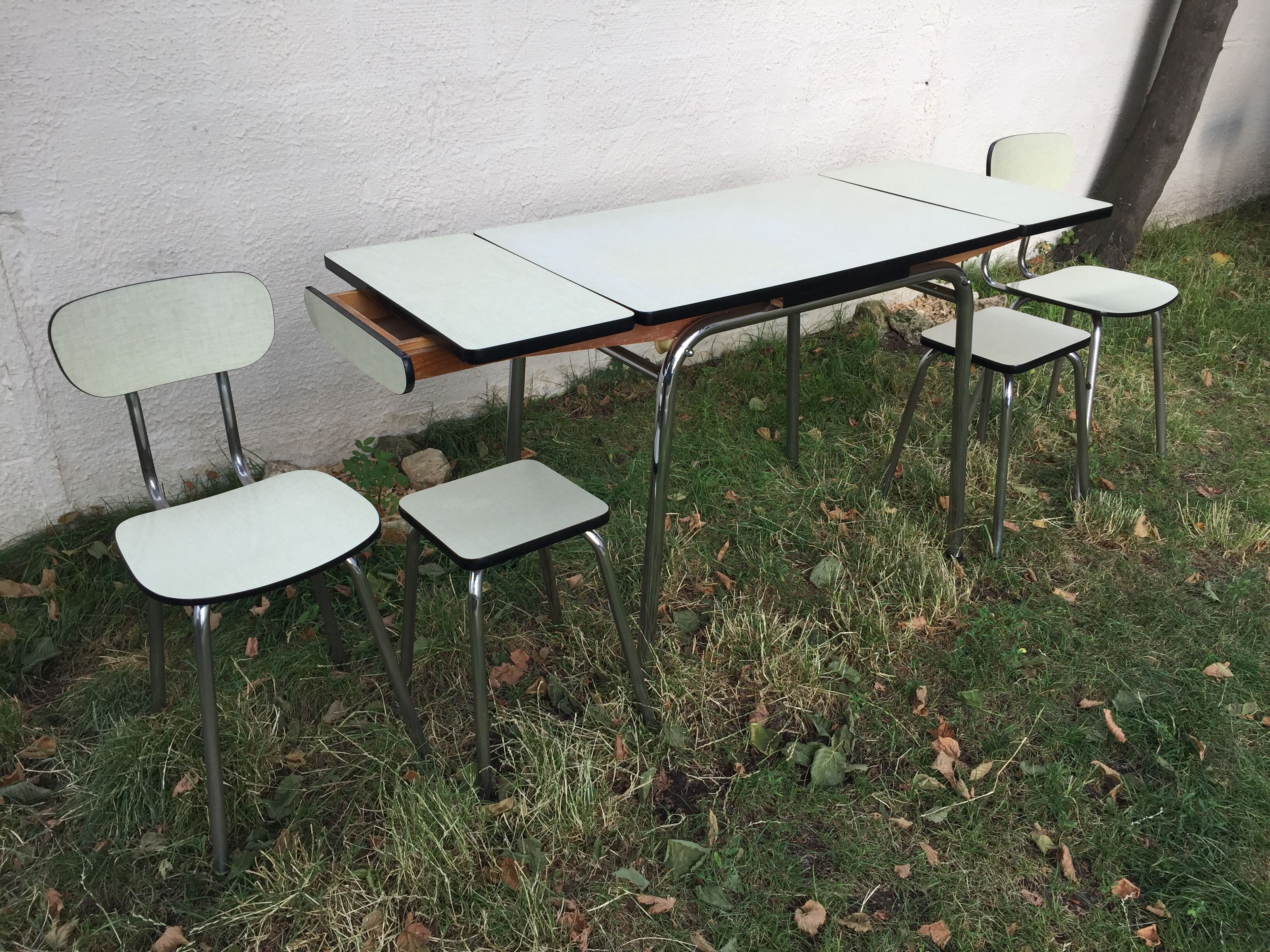 Table with 2 chairs anfd 2 stools