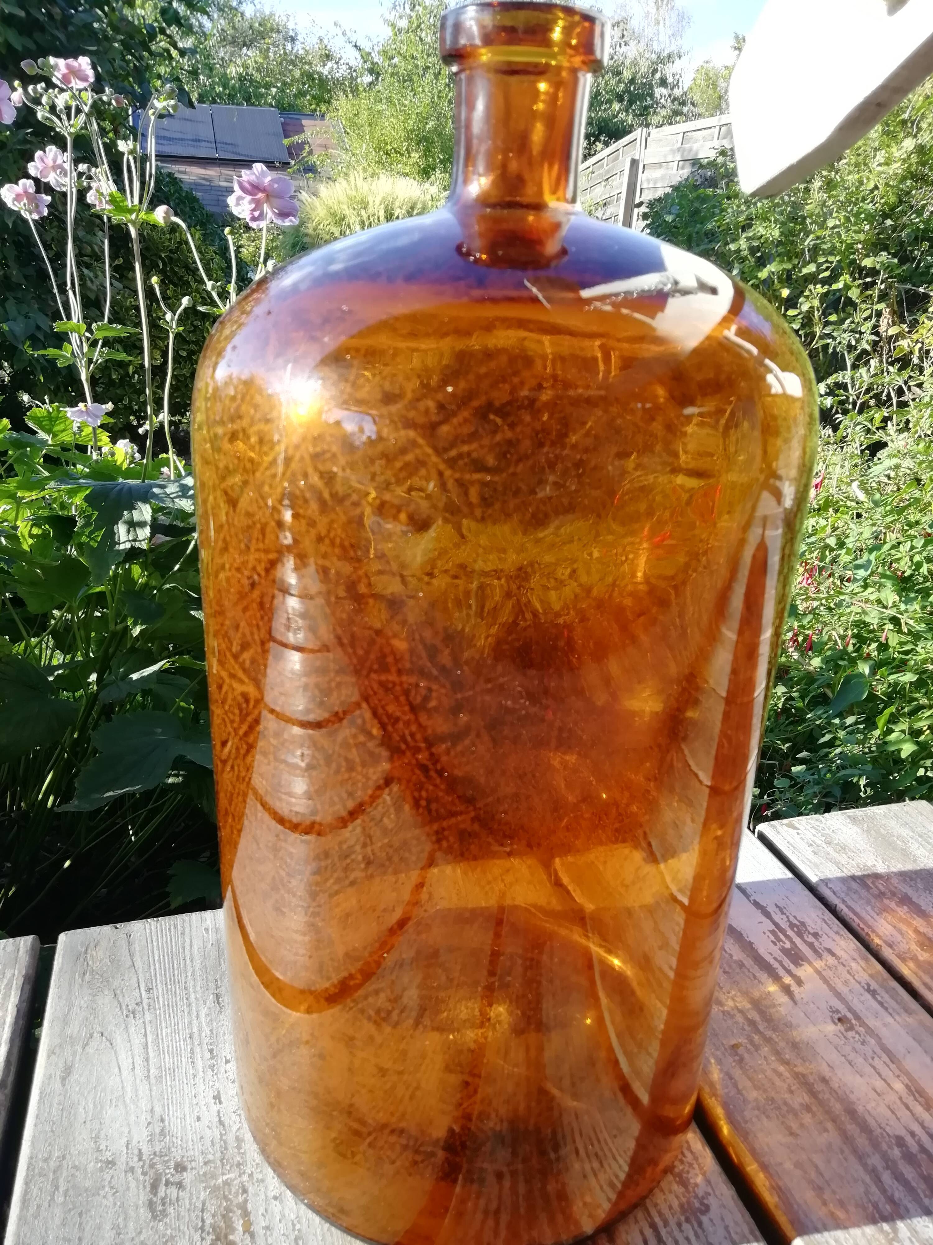Amber color demijohn