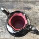 Black Ceramic Vase, pink inside color, signed