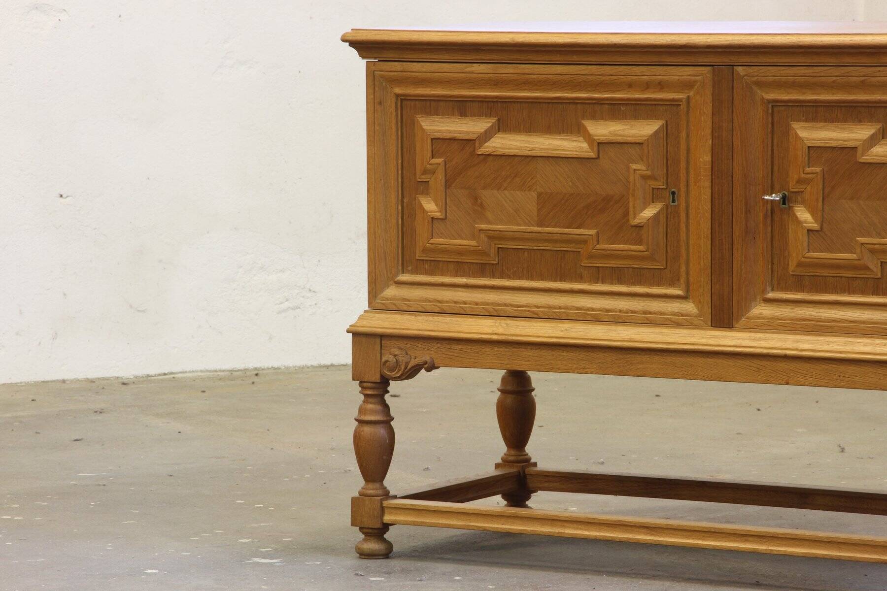 Vintage low sideboard in oak by Henning Kjærnulf, 1960s