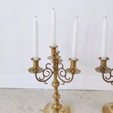 Pair of four-light candle holders in gilded brass