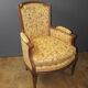 Pair of Louis XVI Bergères in walnut, late 18th century.
