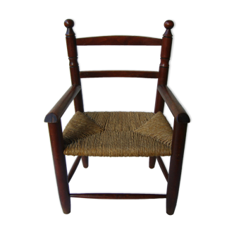 Wooden child's chair and mulched seat