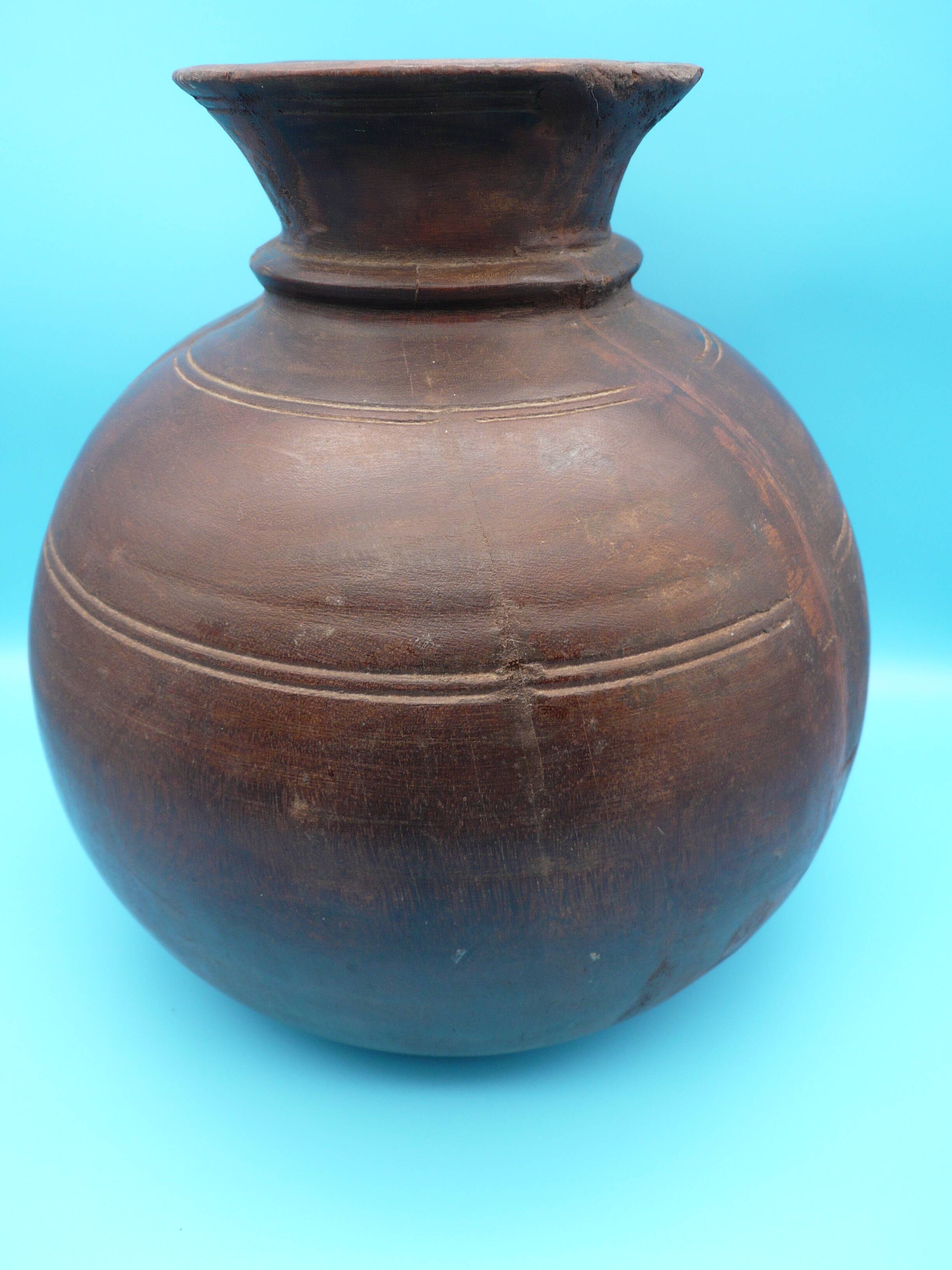 Large carved wooden pot / India