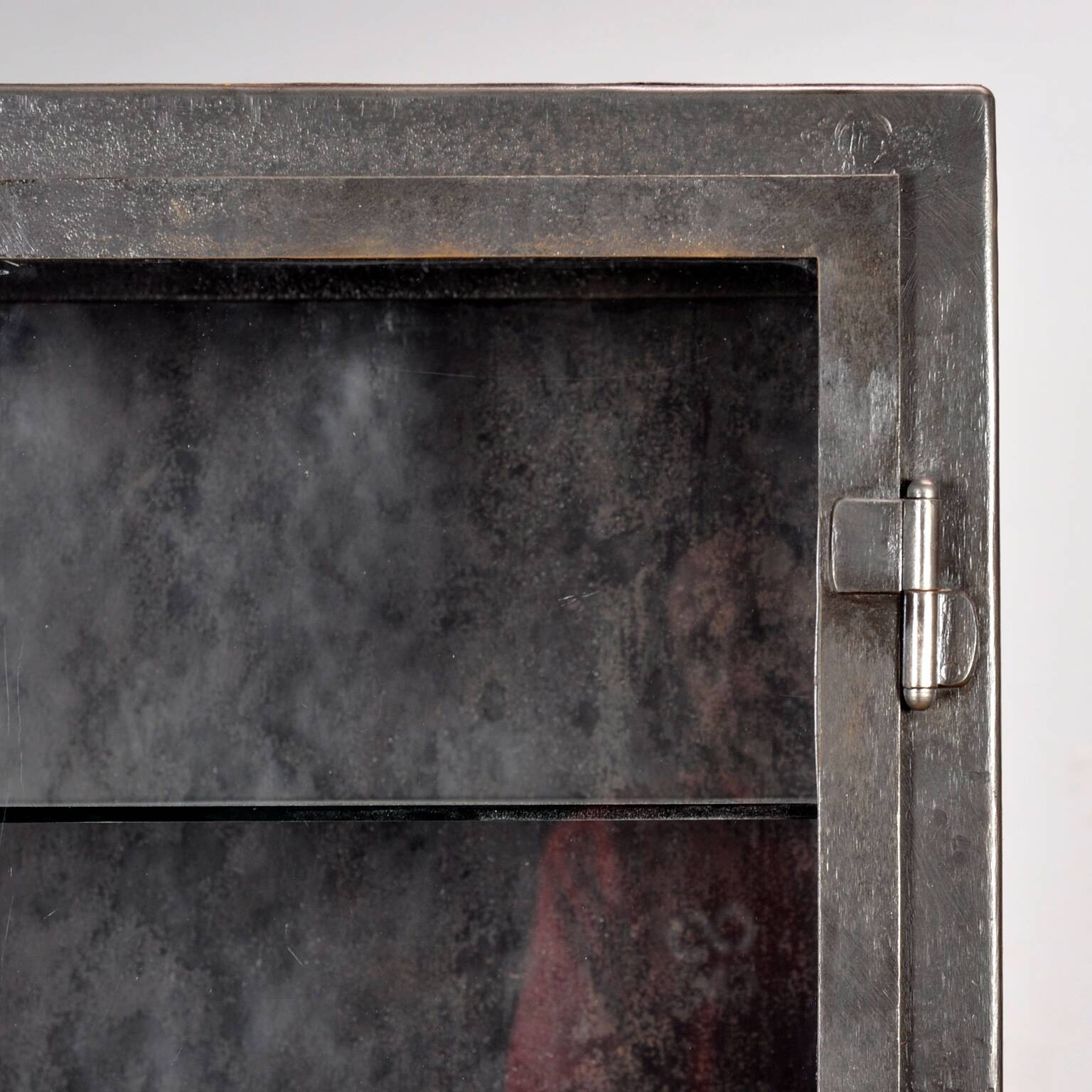 Polished iron medical cabinet, 1920s