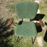 50s chair with armrests.