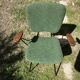 Chaise à accoudoir des année 50 .