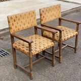 2 Henri II armchairs in solid wood and yellow-beige velvet.