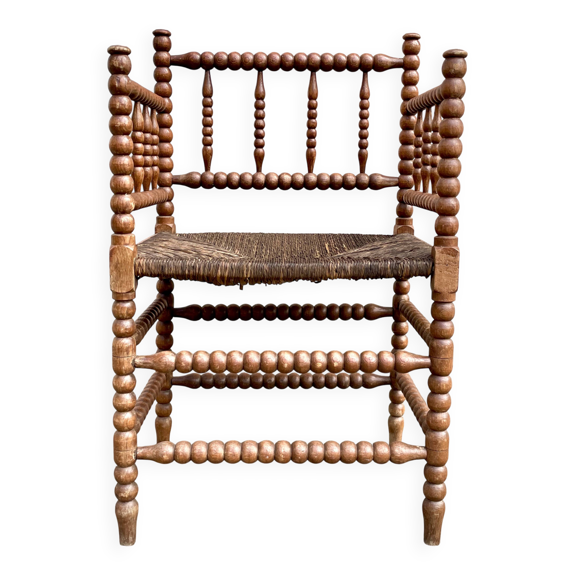 Antique Bobbin armchair with straw seat