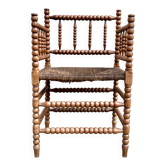 Fauteuil Bobbin ancien avec assise en paille
