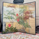 Two-panel screen with a decoration of plants and birds, Japan.