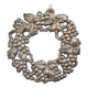 Trivet with vine decorations