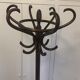 Old curved wooden parrot coat holders