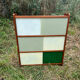 Vintage 1960s display shelf with sliding glass doors.