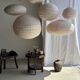 Large round pink Japanese-style suspension made of rattan and natural linen D60.