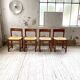 Set of 4 elm straw chairs from the 50s
