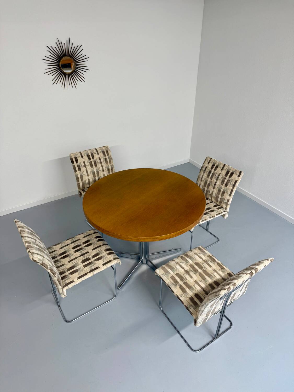 Old round table in solid wood and metal, vintage 70s design