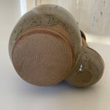 Old varnished stoneware pickle pot with tongs