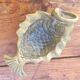 Brass fish pocket empty