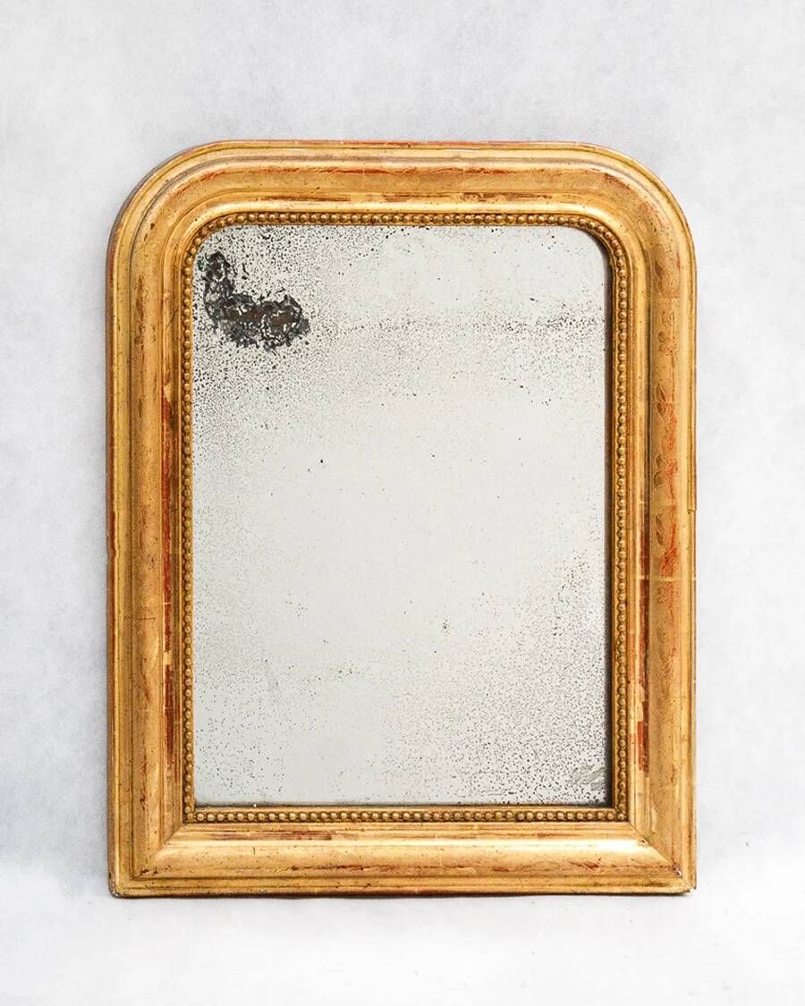 Set of two small French Louis-Philippe gilt red mirrors from the 19th century.