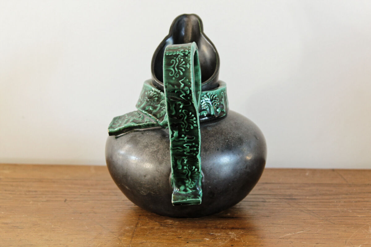 Pitcher in earthenware, metallic black