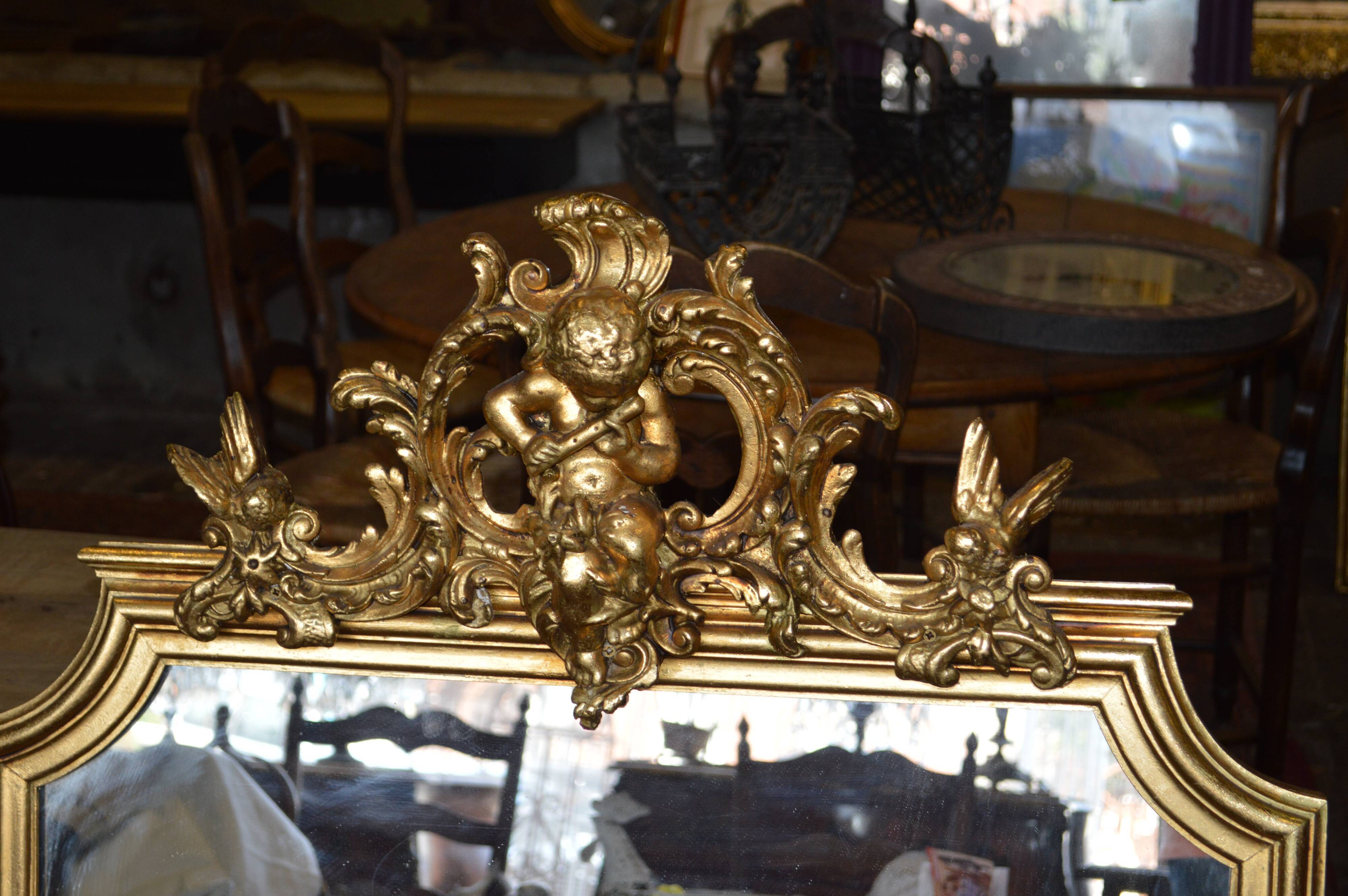 Golden mirror with a flute player angel - 120x82cm